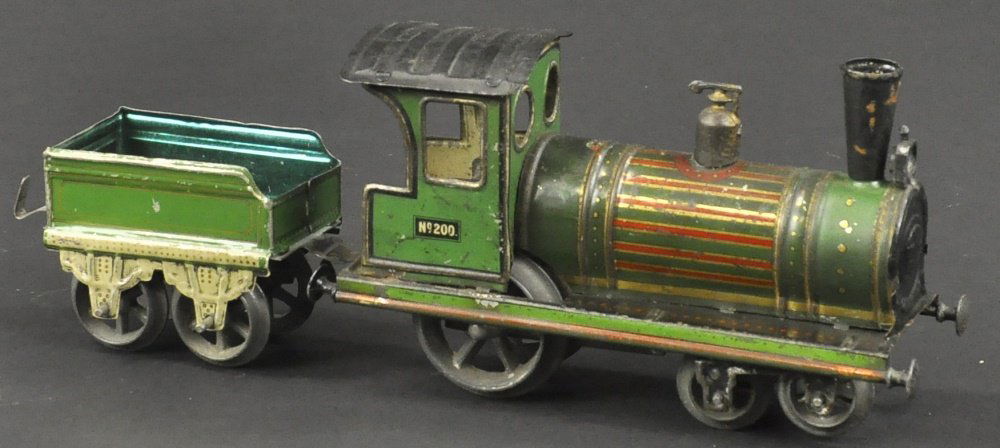 ISSMAYER LOCOMOTIVE 4-2-0: Lithographed tin, marked No. 200 on sides, together with four wheel tin tender in green body. 10" overall length.