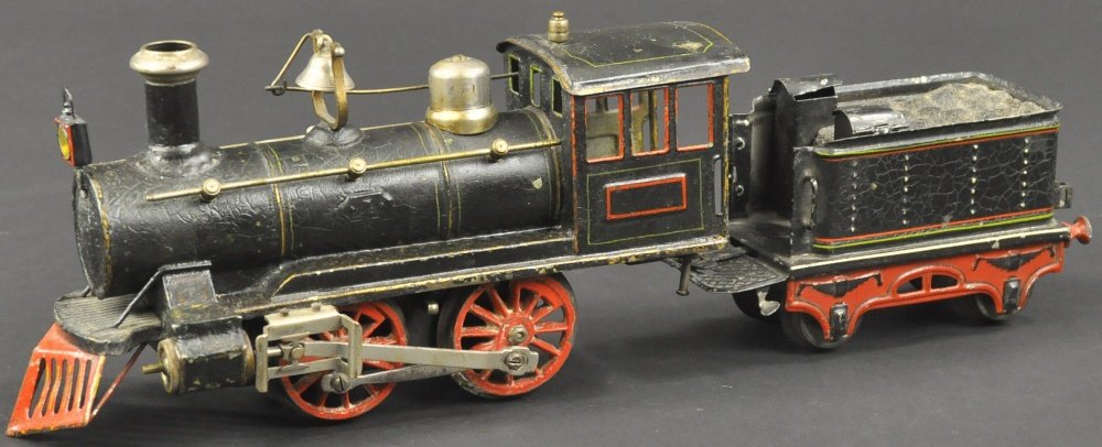 MARKLIN I GAUGE LOCOMOTIVE AND TENDER: Germany, 0-4-0, clockwork driven, painted in black, nickel rails and dome, red trim and pilot, together with four wheel tin tender. Locomotive 10 1/2" l.