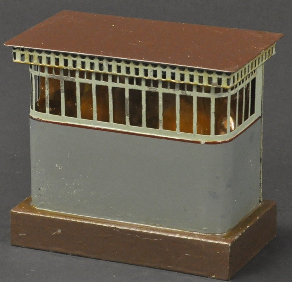 MARKLIN CURRENT REDUCER: Germany, hand painted in grey building with brown roof and base, celluloid inserts at windows, electric wired. 5 1/4" w x 5" h.
