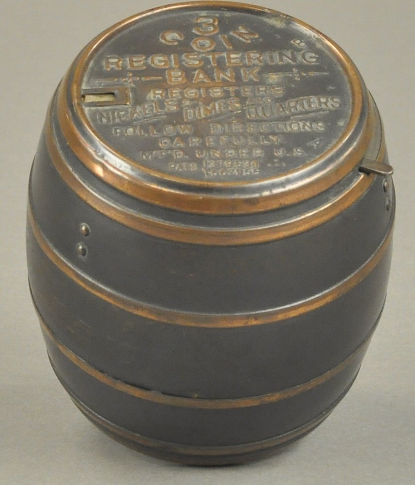 THREE COIN REGISTERING STILL BANK (1 of 2)