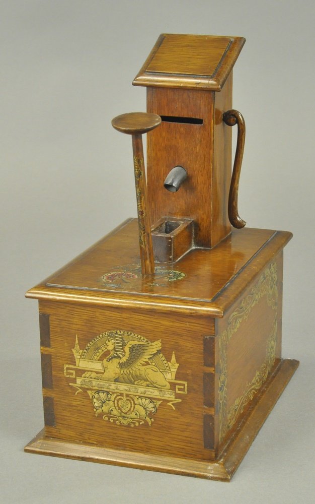 MODERN GRAVITY MECHANICAL BANK (1 of 3)