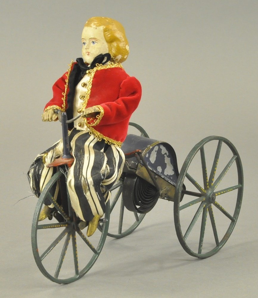 BOY RIDING VELOCIPEDE (1 of 2)
