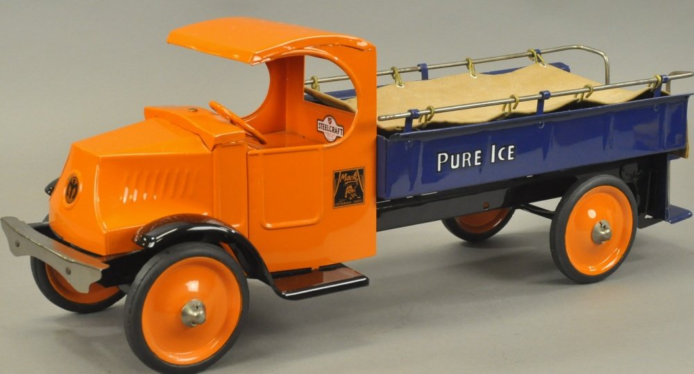STEELCRAFT PURE ICE TRUCK: Pressed steel, Mack open front cab with canvas covered open body, rear step and railing, nice color scheme of orange and blue. 27" l.
