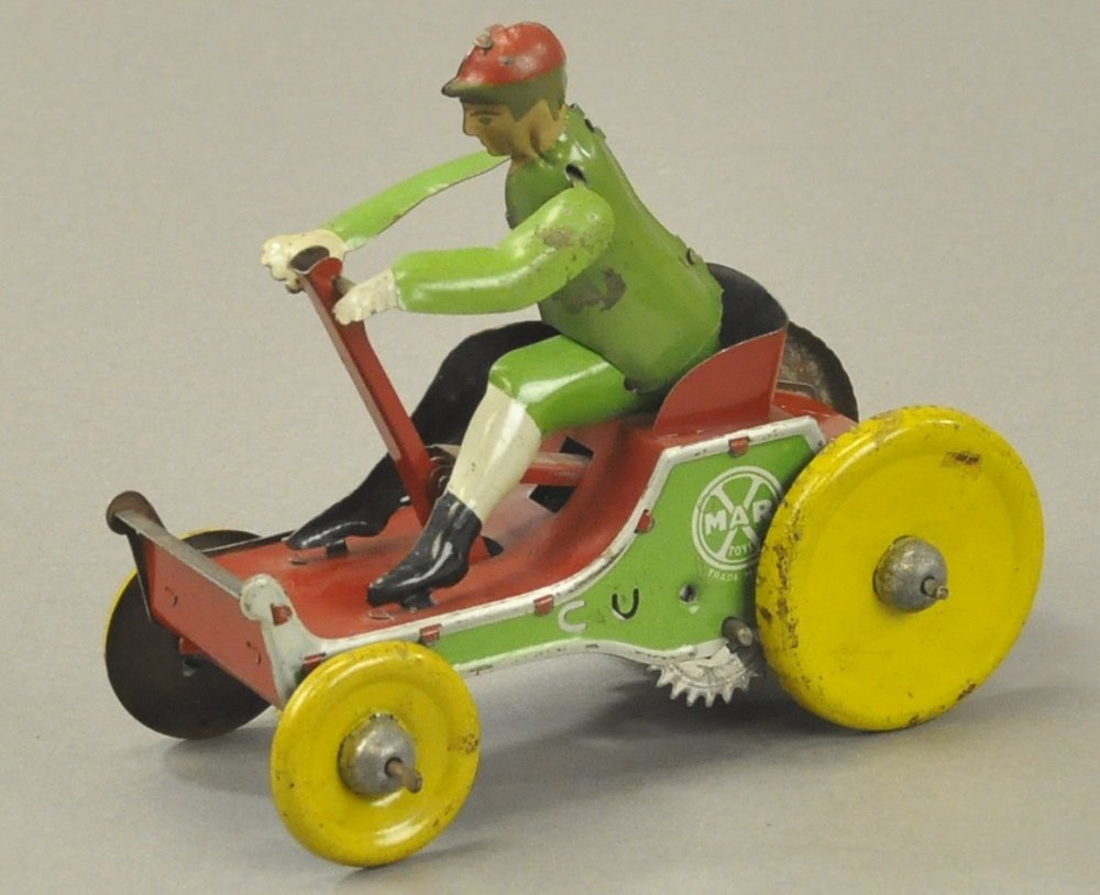 BOY RIDING HAND CART (1 of 2)