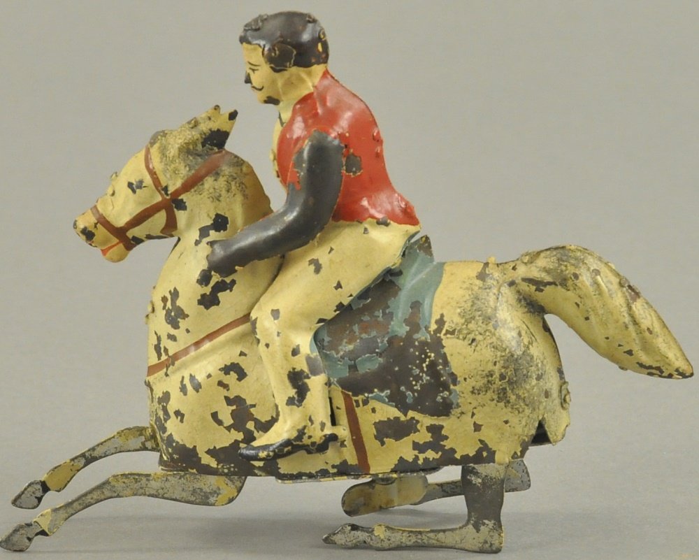 MECHANICAL MAN ON HORSE TOY (1 of 2)