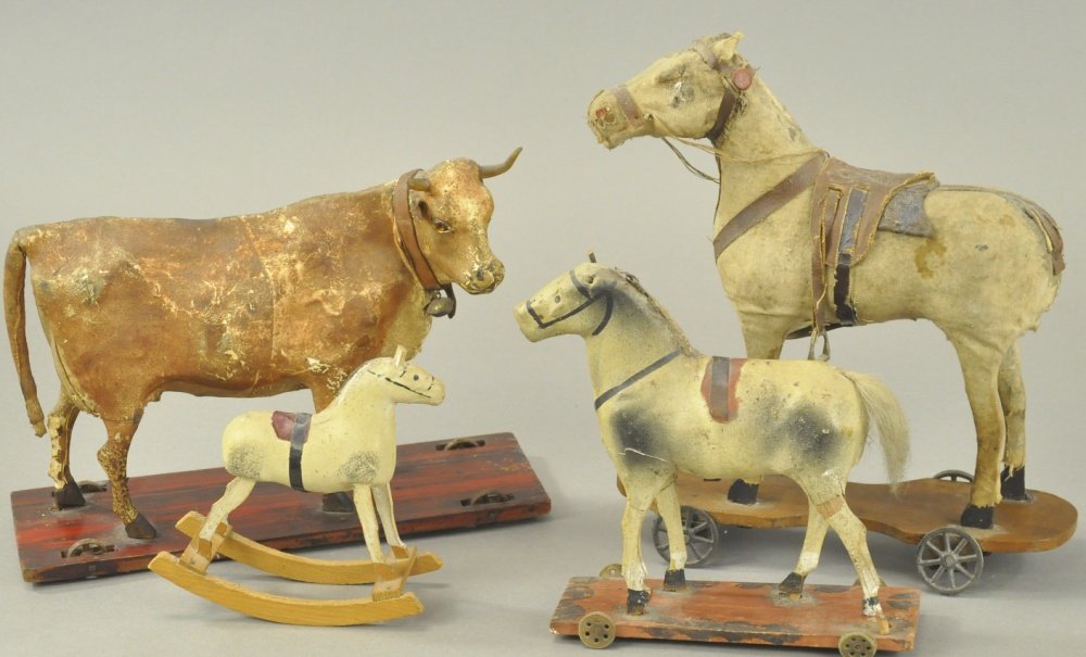 THREE PLATFORM HORSES & COW (1 of 2)