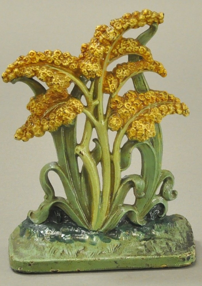 GOLDENROD DOORSTOP: Marked "Hubley '268' Made in USA," realistic coloring and detail to casting. 7 1/8' h.