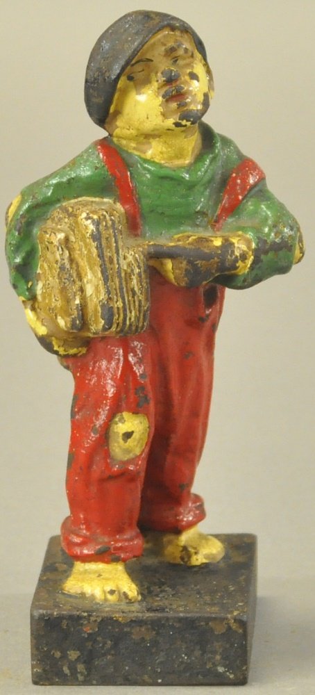 NEWSPAPER BOY DOORSTOP (1 of 2)