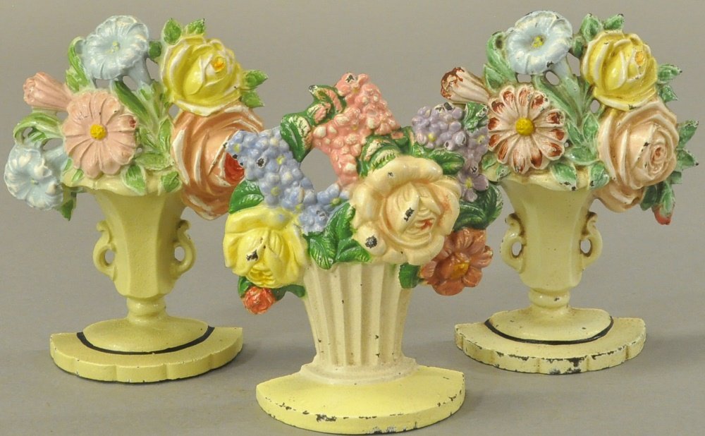 THREE HUBLEY FLOWER BOOKENDS (1 of 2)