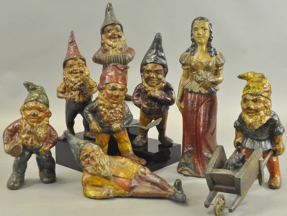 SNOW WHITE & SEVEN DWARFS LAWN ORNAMENTS: Wonderful grouping of a classic set, includes solid cast iron Snow White, seven dwarfs, two holding tools for mining, great hand painted details and lovely portrayal of dwarf characters, extremely sca