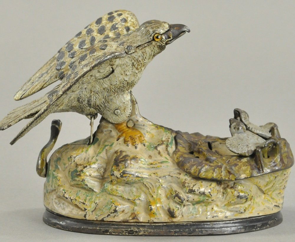 EAGLE AND EAGLETTS MECHANICAL BANK (1 of 2)