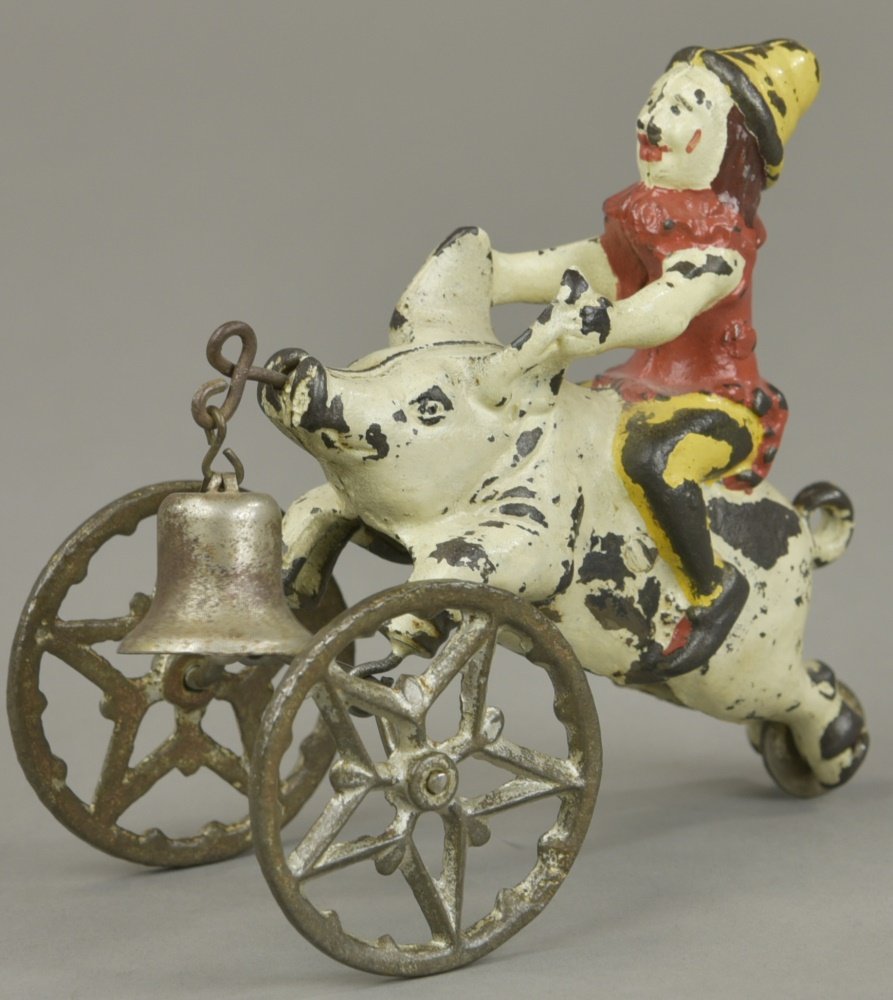 CLOWN RIDING PIG GONG BELL TOY (1 of 2)