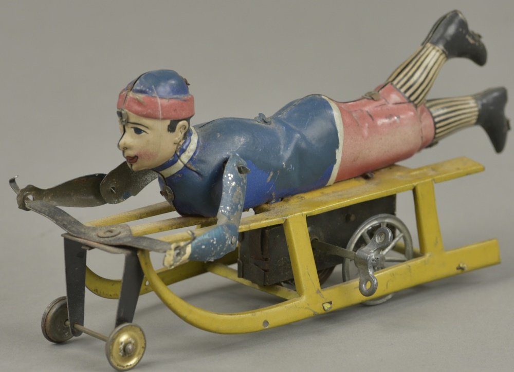 CLOCKWORK BOY ON SLED (1 of 2)