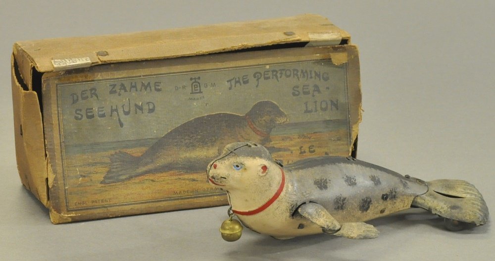 LEHMANN SEAL WITH BOX: Germany, lithographed tin, life-like colors and scale, wind up action, a very popular toy. 7" l.