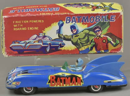 BOXED BATMAN AUTOMOBILE: ASC, Japan, sleek looking Batmobile, lithographed tin done in blue with Bat graphics throughout, Batmans head swivels, friction driven. 9" l.