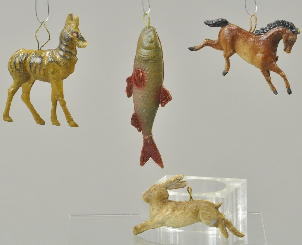 FOUR NICELY DETAILED GERMAN DRESDENS: Prancing horse, Jack rabbit, swimming fish, and a coyote. 2 1/2" - 3" l.