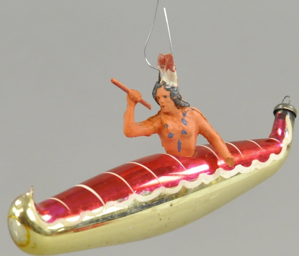 RARE COMPOSITION INDIAN IN CANOE ORNAMENT (1 of 3)