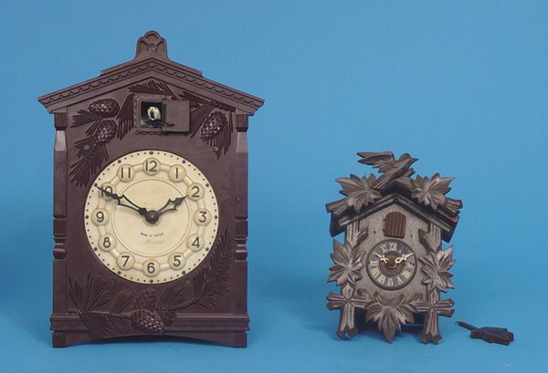 Two Small Cuckoo Type Wall Clocks: Circa 1950 Russian USSR 30 Hour Wall Clock with 5" Good original dials, Brass movements, Photographed left to right. Two clocks as found. Fair condition with wear, lacking pendulums and weights. Needs