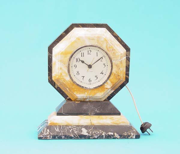 Seth Thomas Art Deco Electric Mantel Clock: Circa 1930 American Seth Thomas Electric Mantel Clock with 4" Good original signed silvered dial, Original electric time only movement, Gold & black variegated marble electric mantel clock. Fair condi
