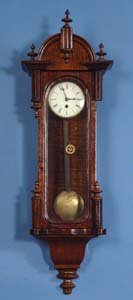 Mini Weight Vienna Regulator Wall Clock: Circa 1885 German Unsigned 3 Day Wall Clock with 4" Replaced painted convex dial, Brass weight driven movement, Unusual Vienna Regulator made of various figured woods. Brass pendulum bob with wood rod