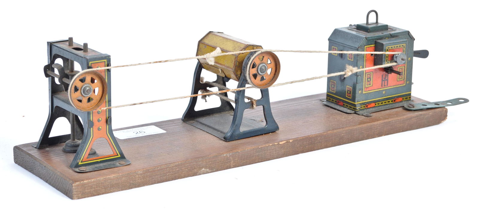 A charming and rare antique early 20th century circa: A charming and rare antique early 20th century circa 1920's ' JLH ' ( John Leonard Hess ) made ' Dynamobil ' tinplate toy. The arrangement comprising of a ' Dynamobile ' friction driven hand-cracked m