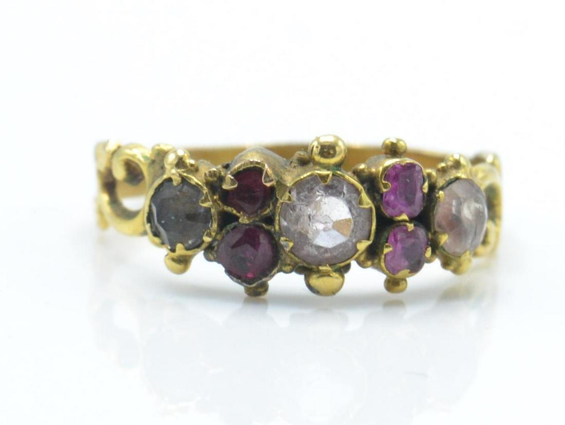 An antique gold ruby and coloured stone ring. The ring (1 of 4)