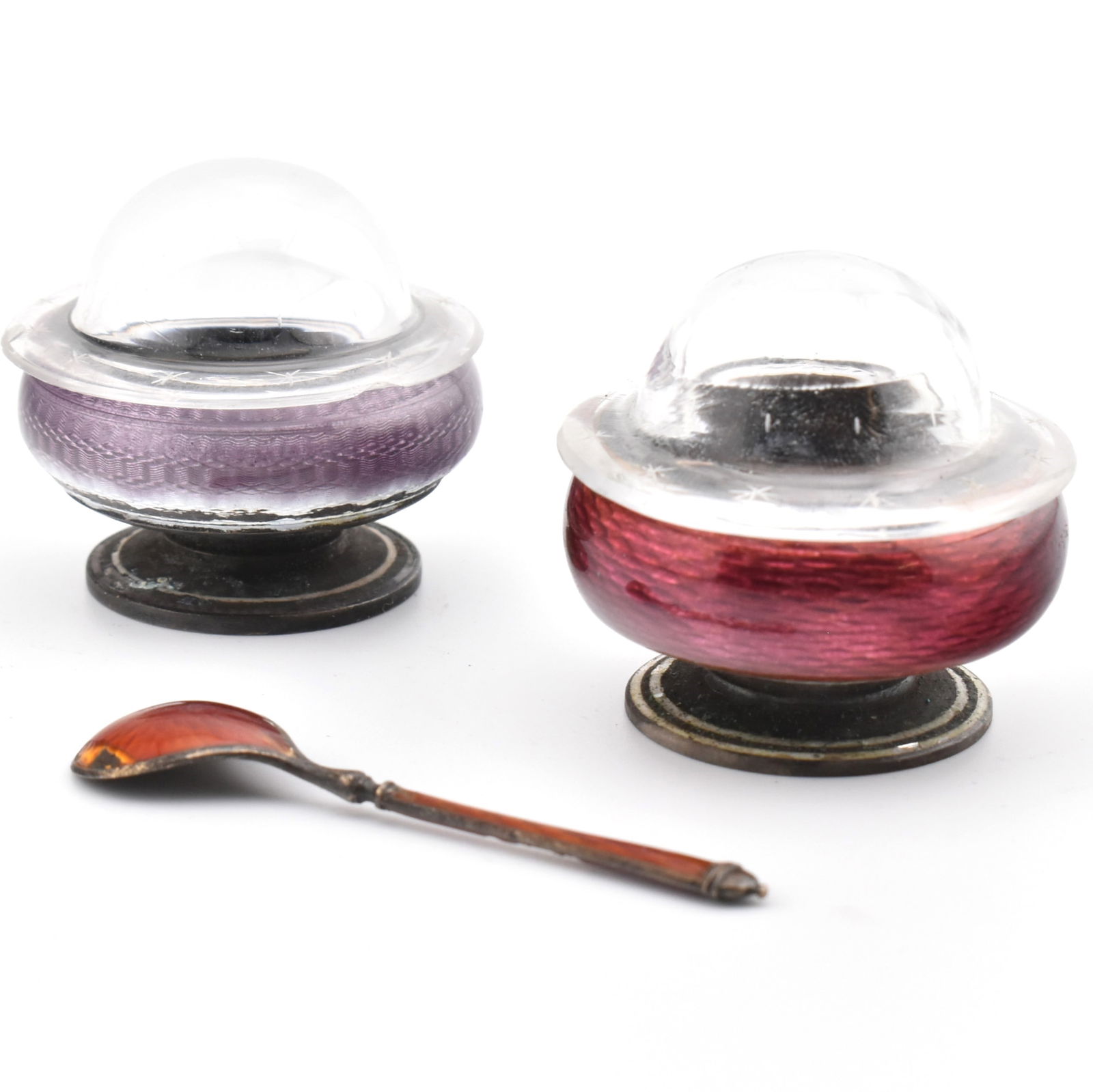SCANDINAVIAN SILVER & ENAMEL GUILLOCHE MINIATURE TEA LIGHTS: Mid-century Scandinavian 925 silver and enamel set miniature tea lights. The tea lights with purple and red guilloche enamel outer bodies with lined interiors - one liner with chipped. Stamped 9