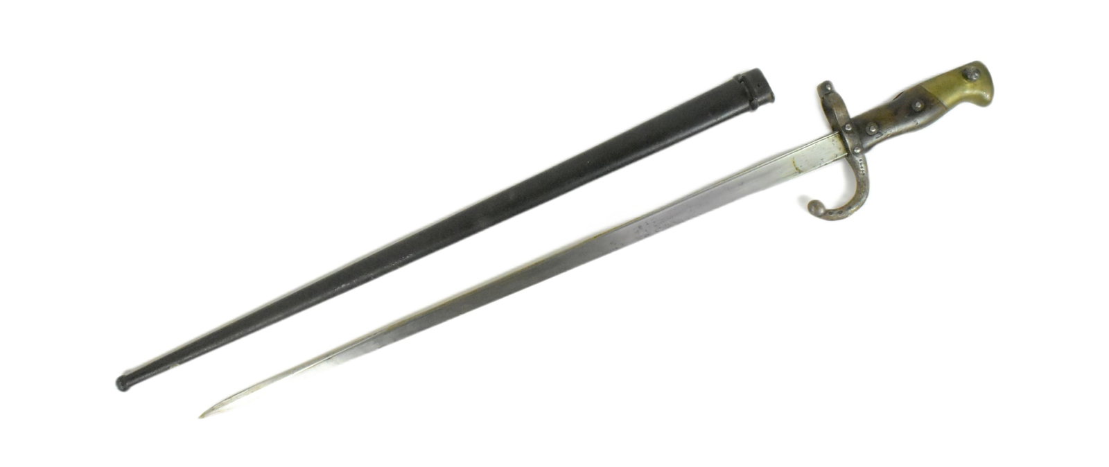 19TH CENTURY FRENCH ME-1874 GRAS RIFLE BAYONET: An original 19th Century French 1874 pattern Gras rifle bayonet. The hilt with brass pommel and wooden grips encasing the tang and secured by rivets. Cross guard with forward facing quillon and muzzle