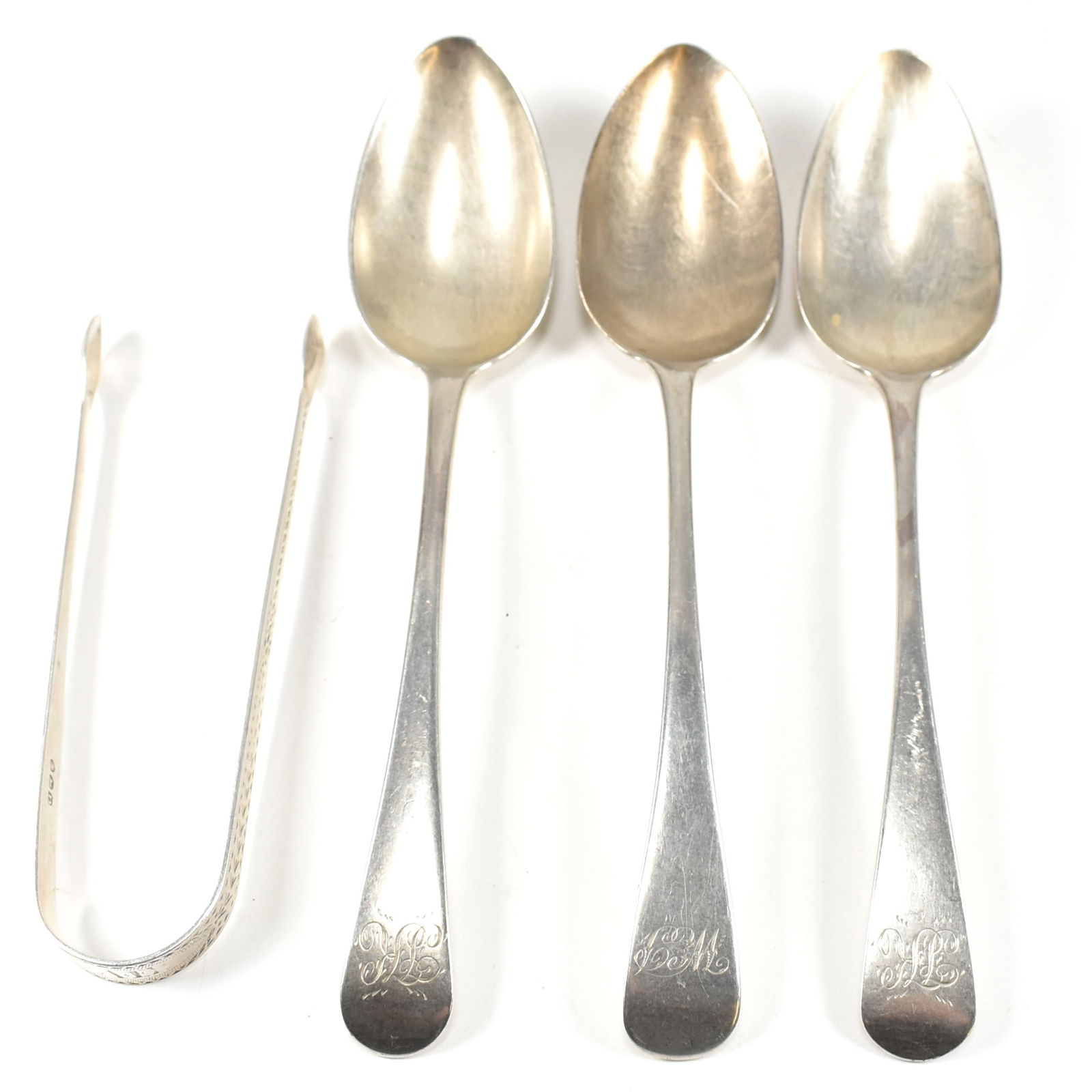 GEORGE III HALLMARKED SILVER SERVING SPOONS & GEORGE III SILVER PAIR SUGAR TONGS: A George III hallmarked silver set of three serving spoons, Hallmarked London, 1802, sponsors mark for Christopher & Thomas Wilkes Barker. Weight 192g. Together with a pair of hallmarked silver su