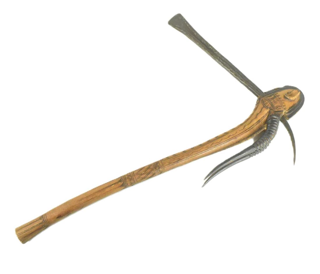 WEST AFRICAN NIGERIAN HAUSA PEOPLE CEREMONIAL AXE: West African Nigerian Hausa people ceremonial axe believed Hausa people. Carved and chase decorated handle with antelope horn and wrought worked steel axe head of thin form. Measures approx 60cm.