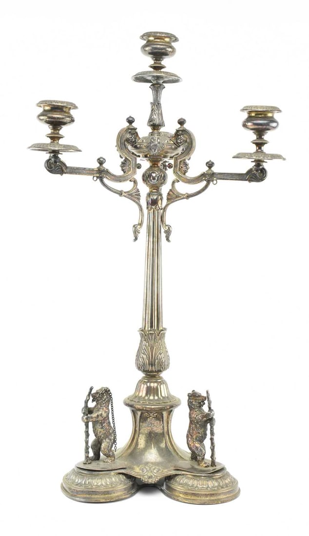 19TH CENTURY SILVER PLATE LARGE THREE BRANCH CANDELABRA: A 19th century silver plated large three branch candelabra. Raised on a trefoil base having three large dancing bears and poles. Classical doric column stem with acanthus leaf terminal rising up to th
