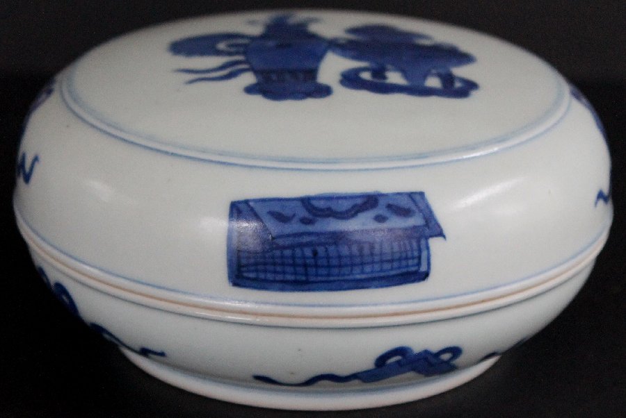 Chinese Blue & White Porcelain Seal Box, Kangxi: Chinese porcelain round seal box with auspicious symbols in underglaze blue. Double circle mark in underglaze blue on base. Measures 4 3/4in diameter.