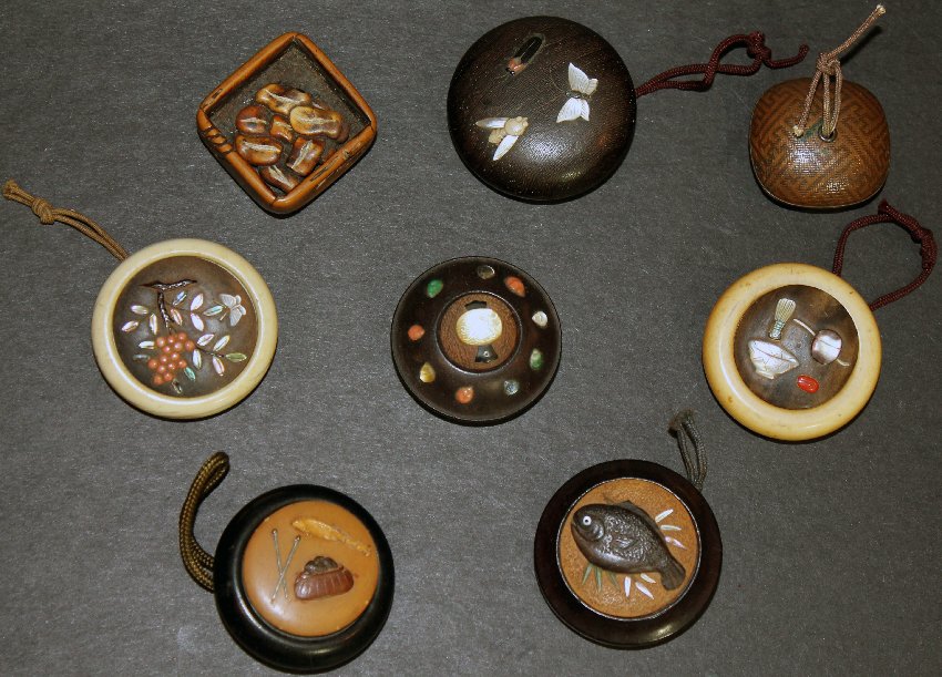 Group of 8 Antique Japanese Ivory Wood Manju Netsuke: Collection of eight different Japanese netsuke make of wood, ivory and metal. Some with inlay decoration.