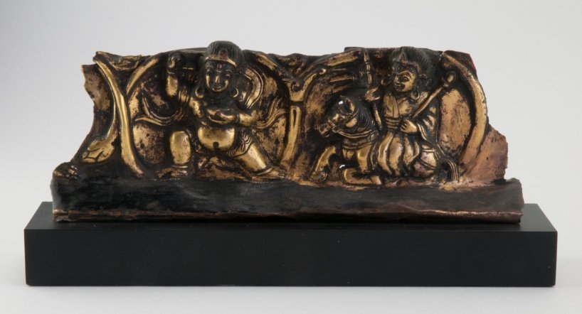 Temple piece: Gilt brass-lamella on base. Scene from a religious story. Tibet, Nepal, 18th century.