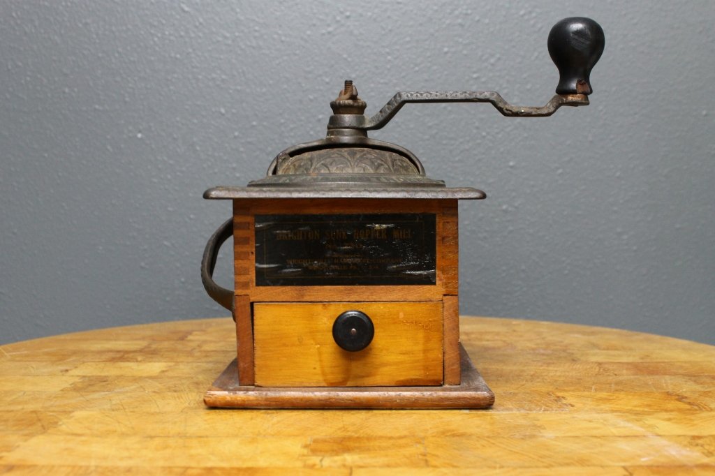 Antique Coffee Mill w/ Mfg. Sticker: Antique Coffee Mill w/ Mfg. Sticker Reading Brighton Sunk Hopper MIll no 730 etc. Also company stamping on top, Handle side mounted