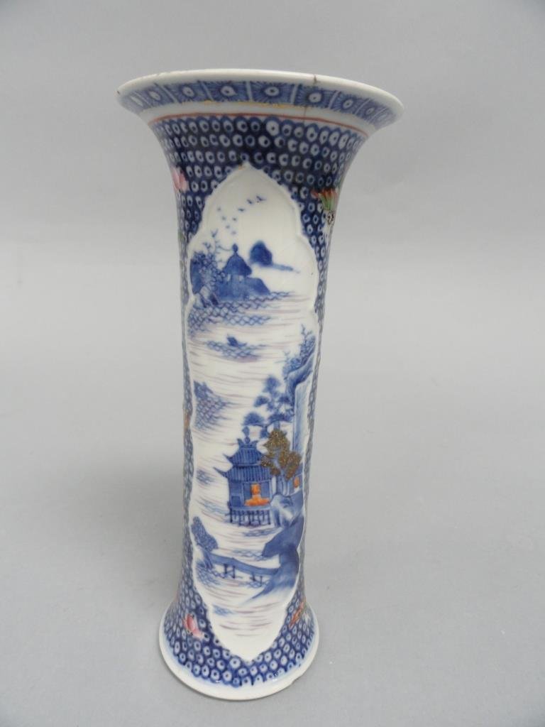 19th Century Chinese Clobbered Beaker Vase: Antique Chinese Blue and White Vase Qianlong Period. Decorated with Mountains, Birds, Temple. Flowers and Butterflies in colorful detail. Beautiful Piece. Condition Fair, Wear consistent with age. Rep