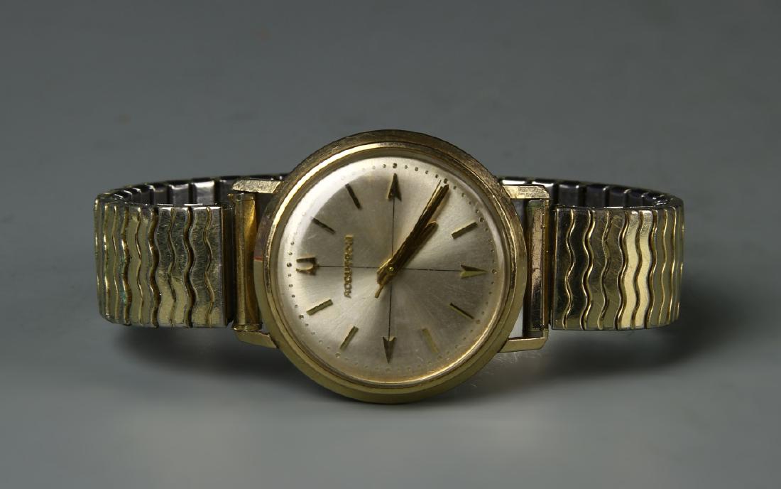 Watch: Bulova watch, accutrun 10 K gold filled watch. 3 in.