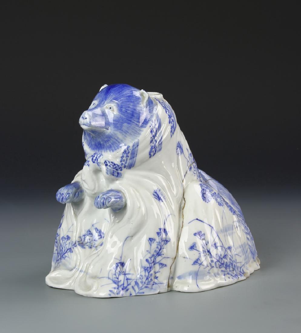 Japanese Blue and White Porcelain Animal: Japan, 19th C., blue and white porcelain animal, minor hairline crack. Height 8 1/4 in.
