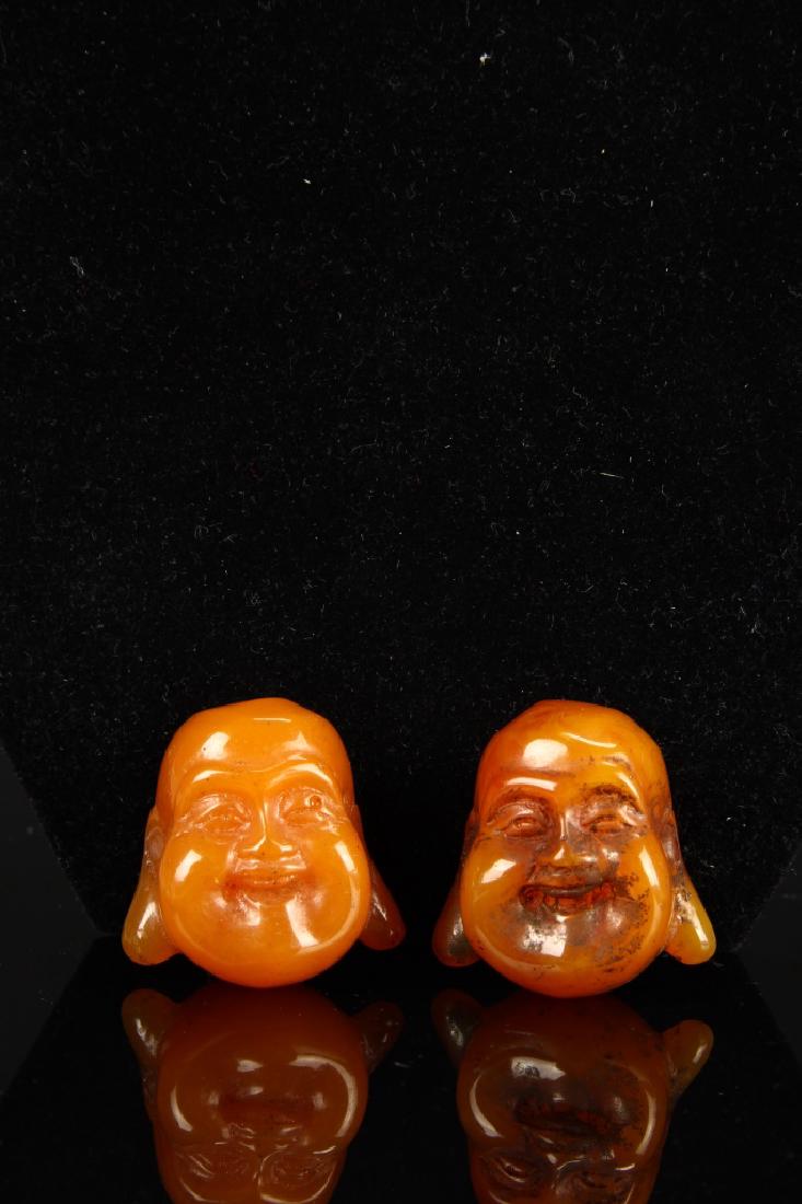 Two Chines Reconstituted  Amber Buddha Heads (1 of 2)