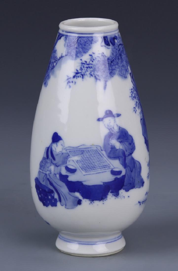 Chinese Blue and White Vase: China, 19th C., blue and white vase, slightly tapering tear drop form, with a footed base, depicting an outdoor board game between a woman and a man, with Guangxu mark. Height 4 3/4 in.