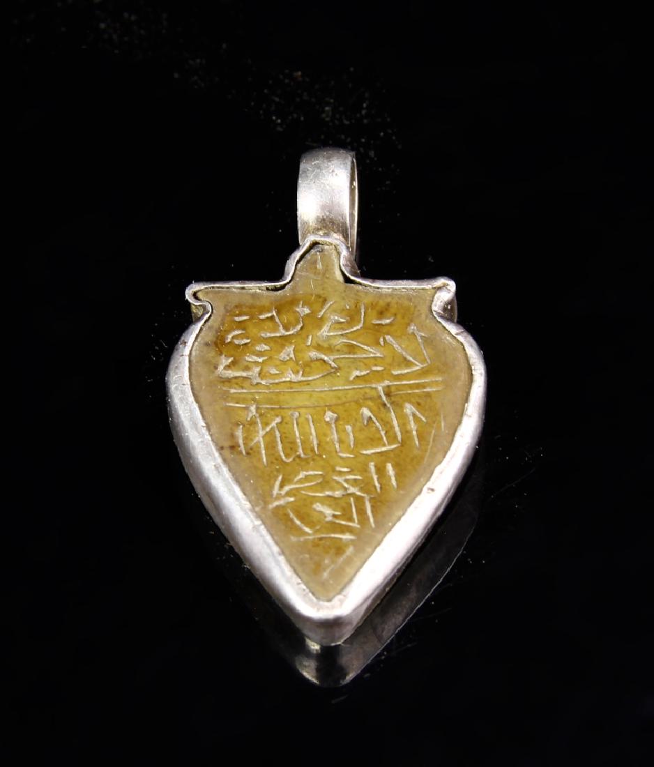 19th Century Stone Pendant with Islamic Inscriptio: 19th Century Stone Pendant with Islamic Inscriptions. _x000D_ Length: 1 7/8 in.