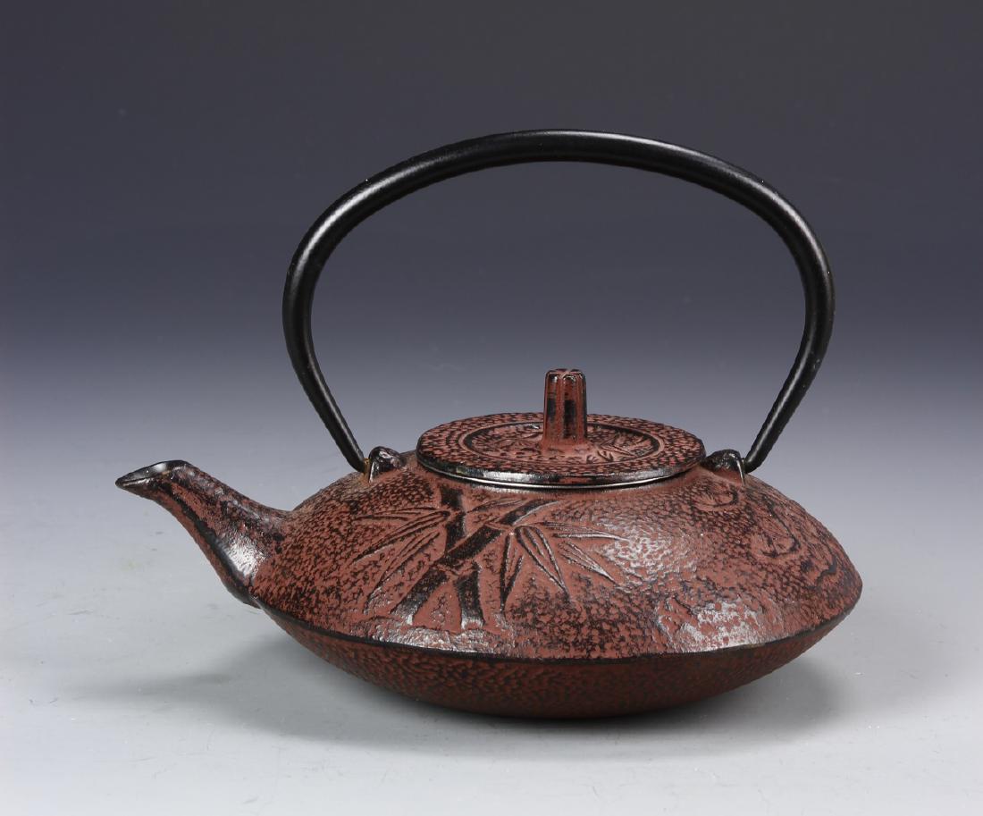 Japanese Iron Cast Teapot: Japan, iron cast teapot. 7 1/2 in., 6 1/4 in.