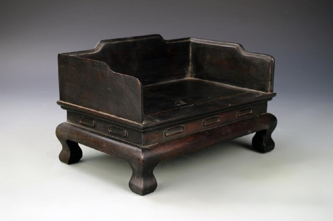 Chinese Rose Wood Toy Bed: China, 19th C., rose wood toy bed. Height 6 1/2 in., Width 7 1/4 in., Length 10 1/2 in.39279