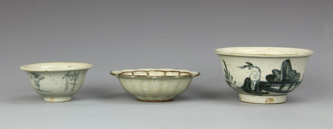 Two Chinese Antique Blue And White Bowl and Dish: China, two antique blue and white bowls and one crackle dish, one blue and white with Chinese characters, other with landscape and figure. Dimensions of Largest 2 1/4 x 4 1/2 In.