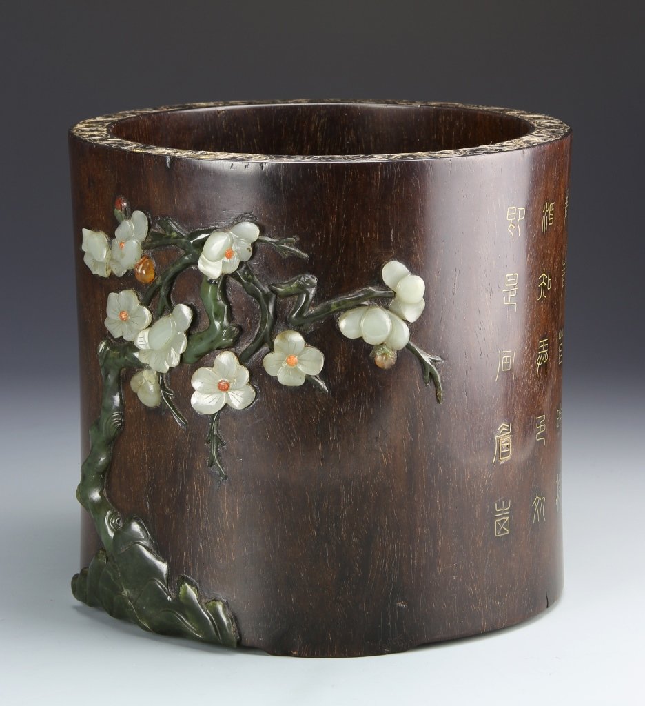 Chinese Huanghuali Brush Pot: China, smoothly carved Huanghuali brush pot, with colorful stone inlays that form a foliate branch, gilt calligraphy characters at the side. Height 7 1/8 in., Diameter 7 1/2 in.