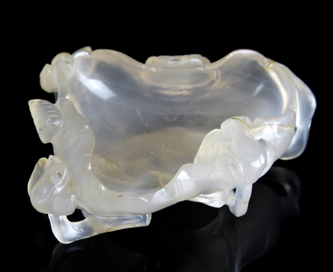 Chinese Carved Agate Brush Washer: China, 19th C., carved agate brush washer, translucent in color, and in a naturalistic form with carved organic elements. Height: 3 1/2 in., Width: 3 3/4 in. Provenance: From the private collection of
