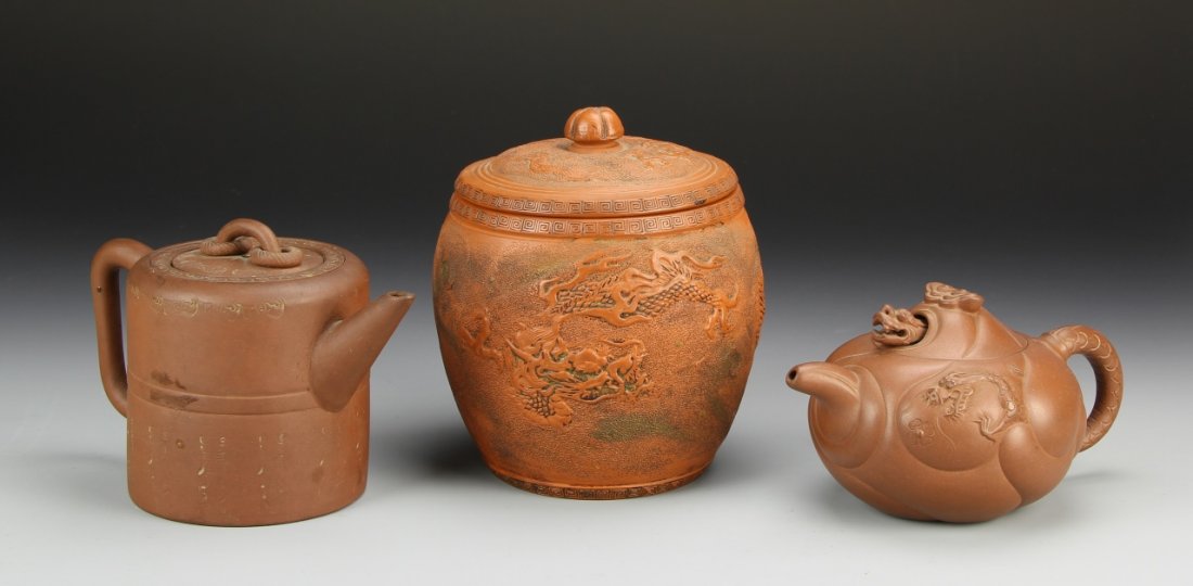 Chinese Yixing Teapot: China, three Yixing Items including two teapots and one jar with cover, biggest: 6 1/2".