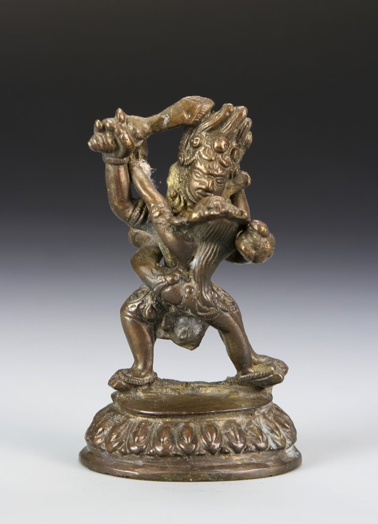 Nepalese Bronze Buddha: Nepal, bronze Buddha figure, in intimate pose with second figure, decorated with highly detailed crown and clothing, with molded base. Height 4 1/2 in.