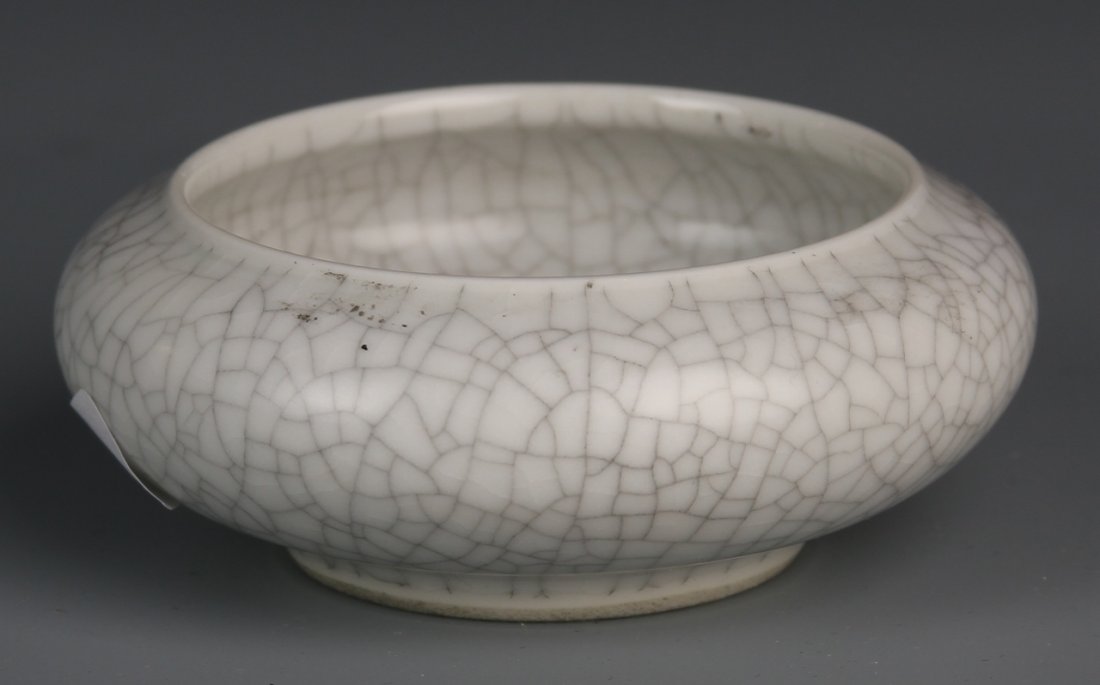 Chinese Crackle-Glazed Brush Washer: China, antique crackle-glazed brush washer, in a rounded form with a white glaze . Height 3 1/4 in.