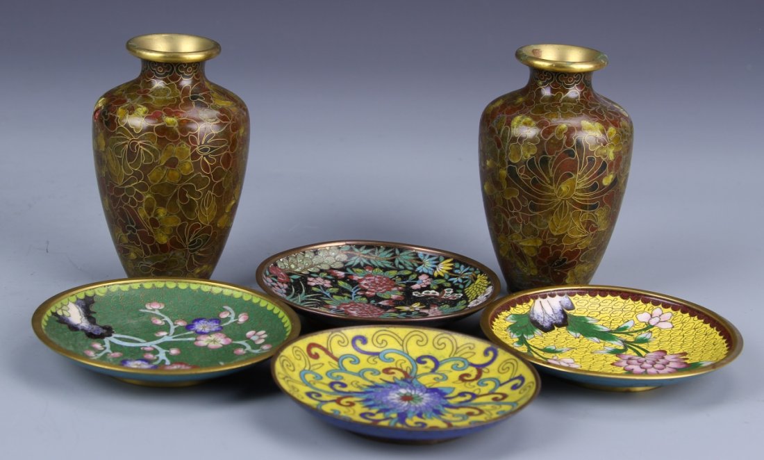 Six Cloisonne Pieces: China, six cloisonne pieces including four dishes and two vases, plates gilt with floral motifs, and with vase with gilt flared lip and tapering neck. Height 4 in.